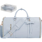 Light blue duffel bag with a bow and gold accents on a white background