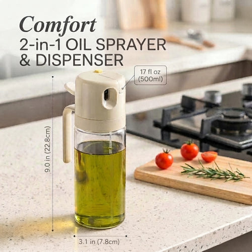 Comfort 2-in-1 oil sprayer and dispenser bottle filled with olive oil, shown on a kitchen countertop with text overlays indicating dimensions and capacity, alongside tomatoes, rosemary, and a gas stove in the background.